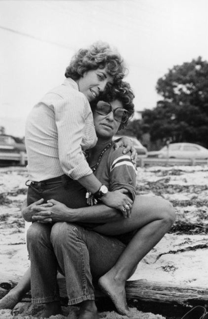 Helaine on her girlfriend's lap, Provincetown, 1974